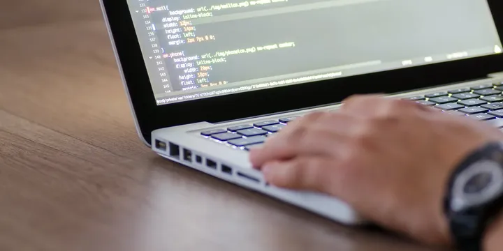 person using macbook pro